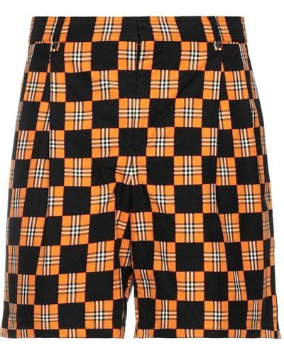 orange burberry shorts
